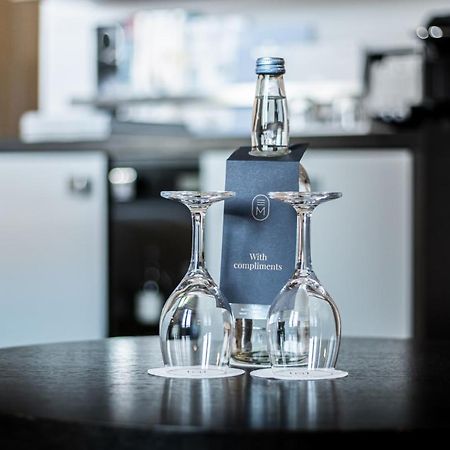 Hotel Maximilian'S アウグスブルク エクステリア 写真 A bottle of water in a hotel room