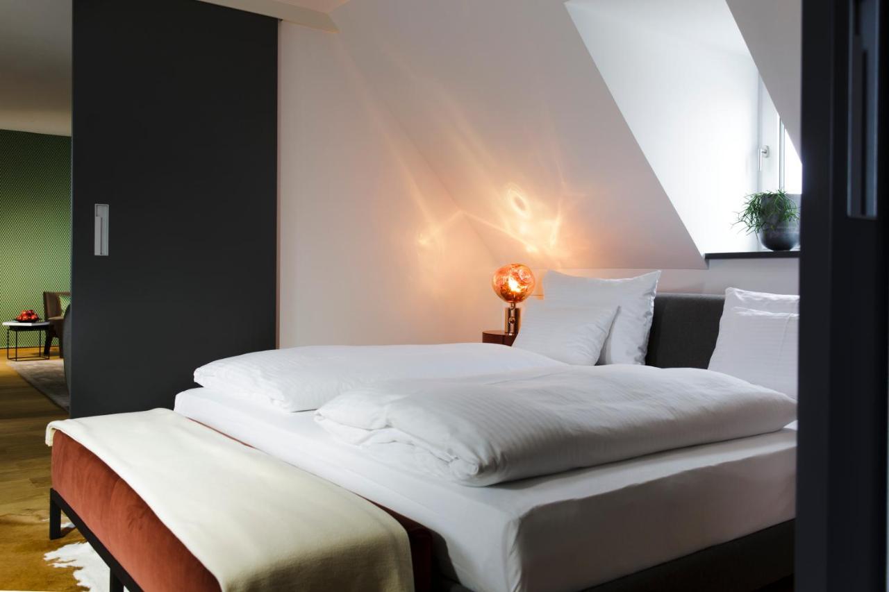 Hotel Maximilian'S アウグスブルク エクステリア 写真 A bedroom